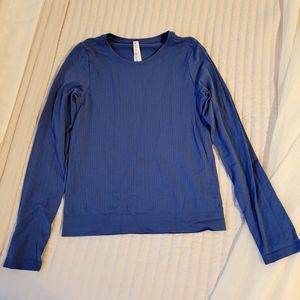 Blue Athleta longsleeve top. Size XS.